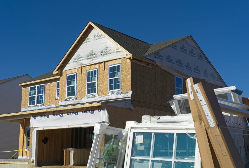 Wood structural framing in progress on a residential construction site